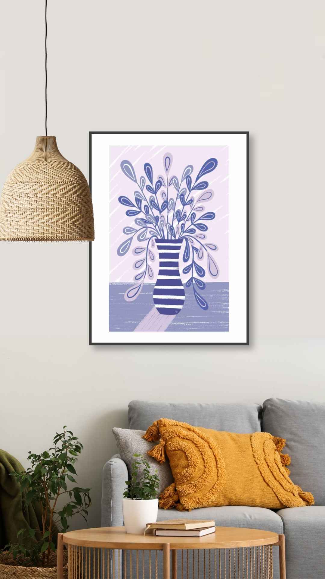 Vase med lilla blomster