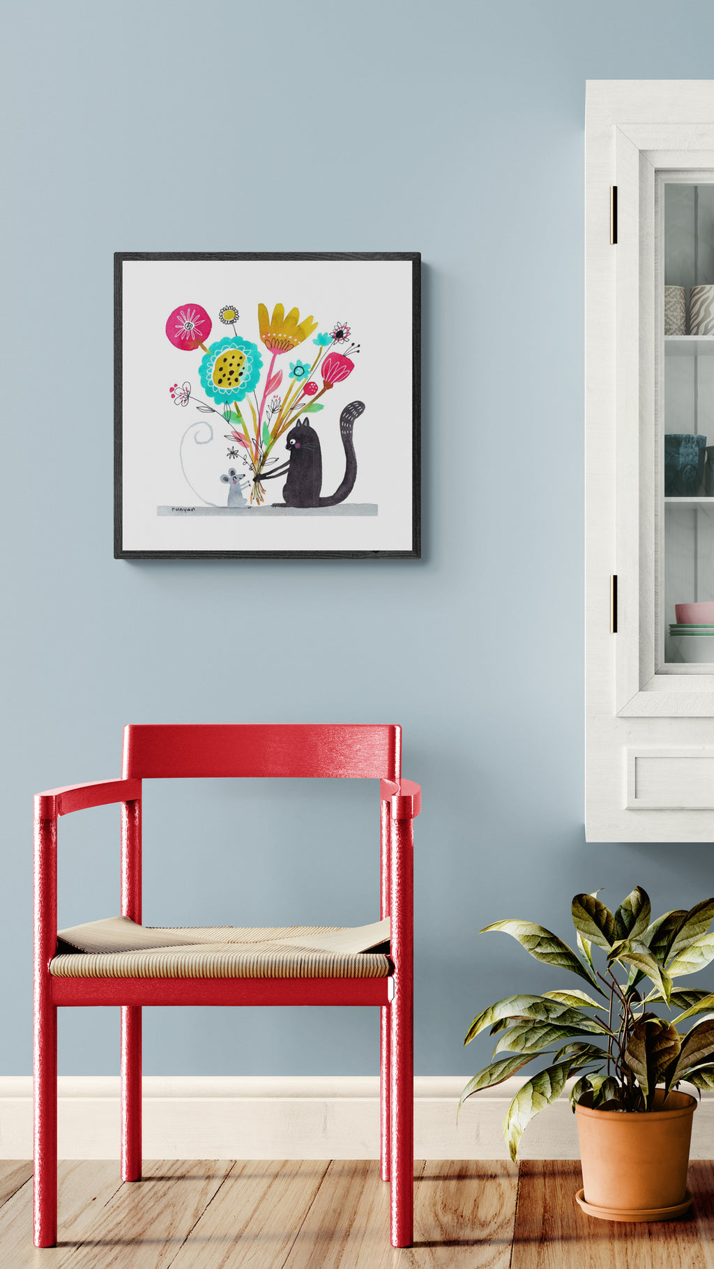Kat med blomster