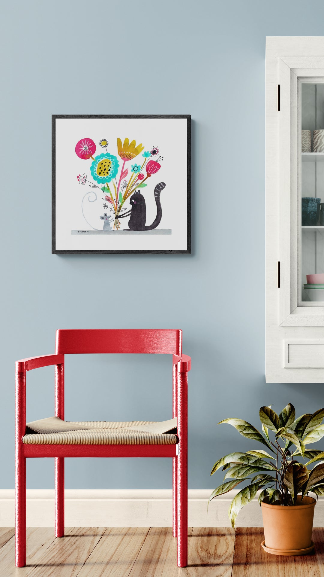 Kat med blomster
