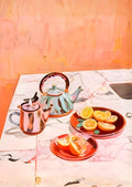 Teapot og citroner