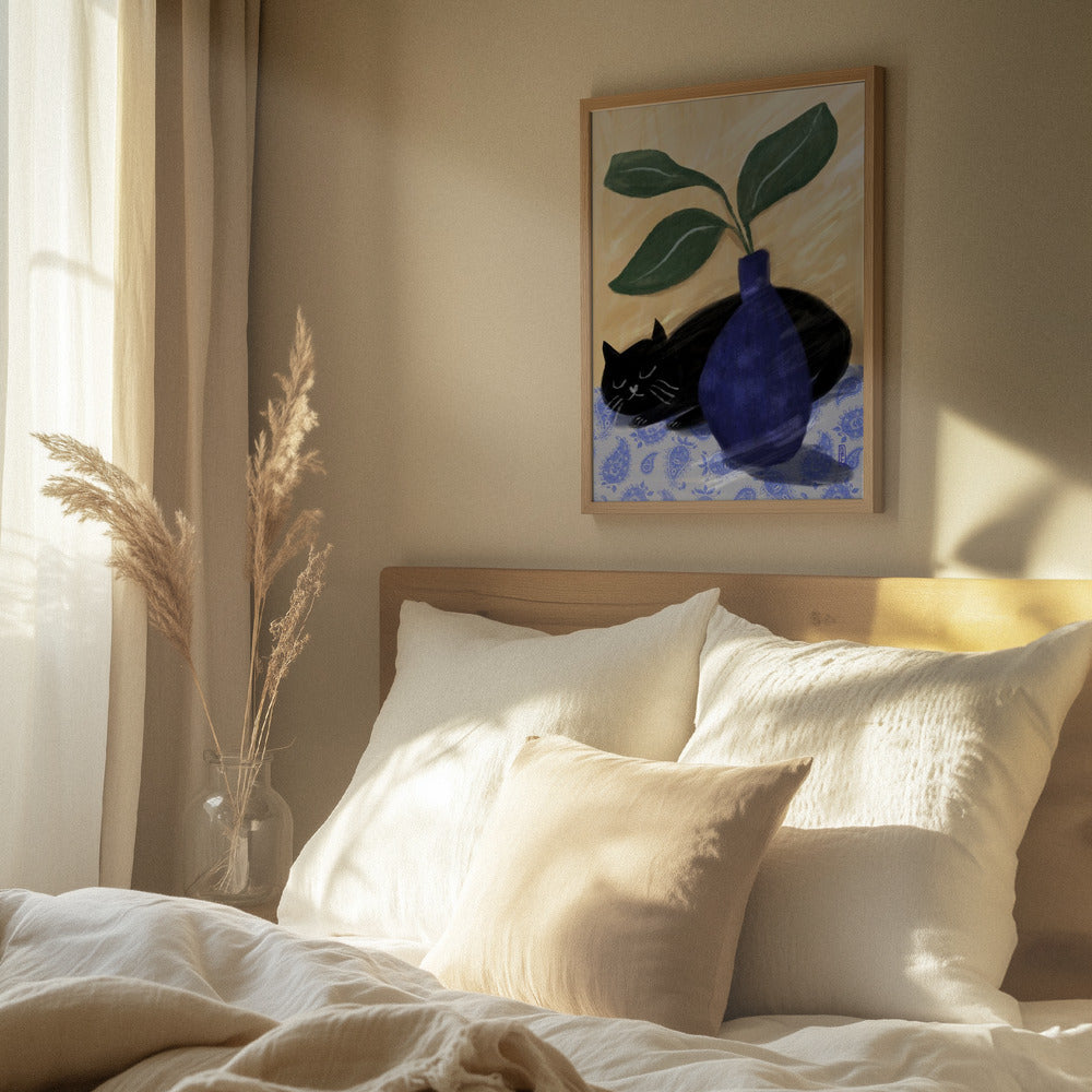 Sovende kat med vase